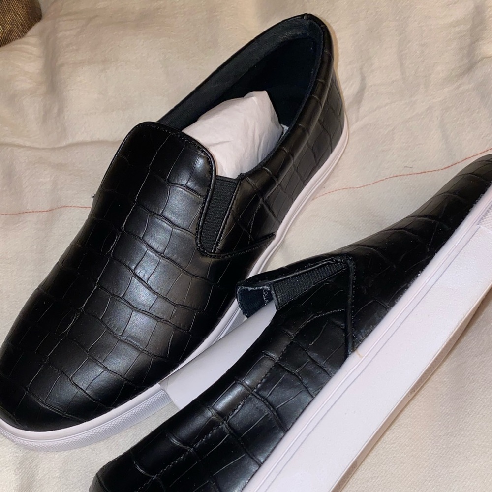 Steve Madden slip on sneakers.
